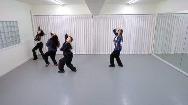 K-POP Dancers Practicing in a Studio
