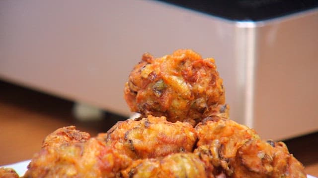 Golden brown fritters of pork on a plate