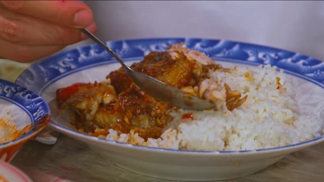 Rice with delicious braised fishand radish