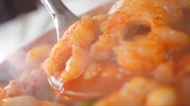 Steaming Spicy Seafood Stew with Various Vegetables