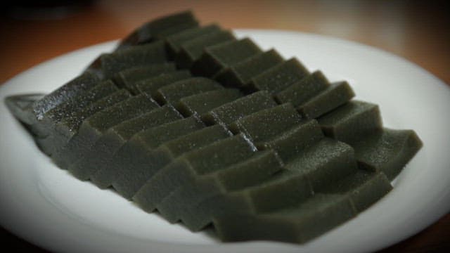Korean green jelly made of seaweed on a white plate