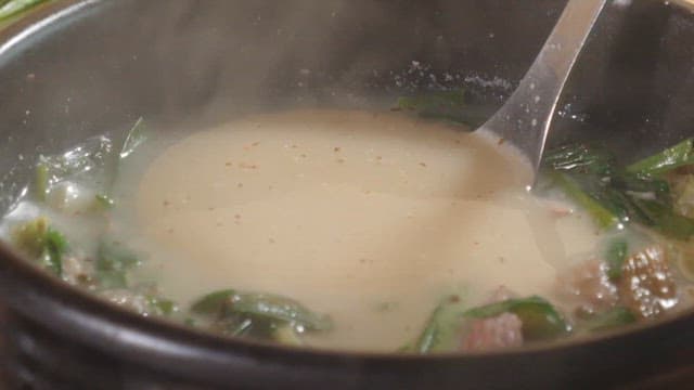 Steaming Ladleful of Beef Rice Soup