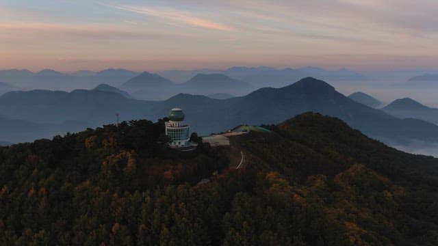Observatory atop a mountain during twilight
