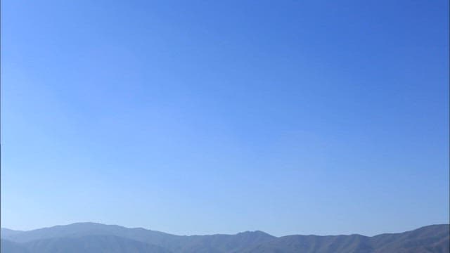 Clear morning landscape of a mountainous village with clear skies