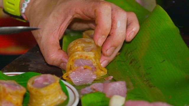 Plating kimchi tuna rolls on a plate