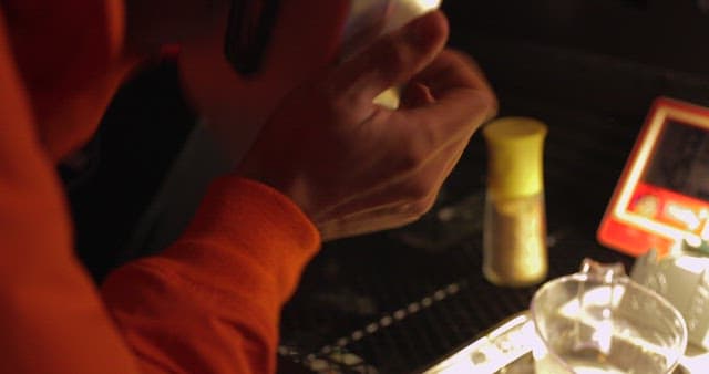Person Enjoying a Meal in a Casual Setting