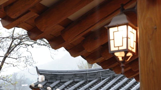 Peaceful traditional roofs of Hanok on a rainy day