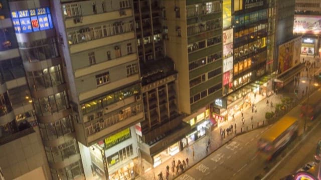 Elevated bustling city street in the evening