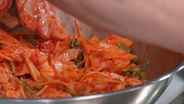 Fresh Korean Melons and Noodles Mixed with Red and Spicy Sauce