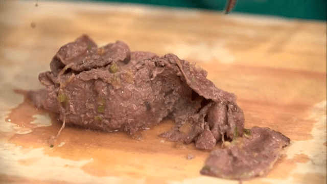 Bulgogi on a wooden cutting board