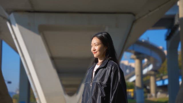 Woman stretching in a sunny park