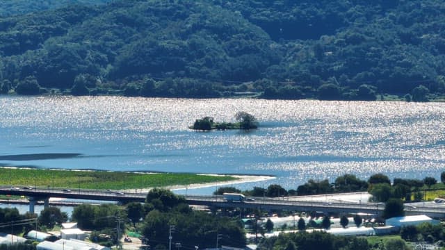 River with a small island and bridge