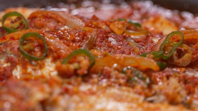 Fish boiled in spiced soy sauce with vegetables