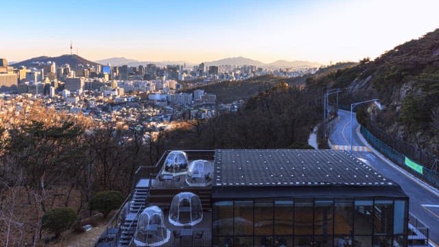 Overlooking the city from a mountainside restaurant