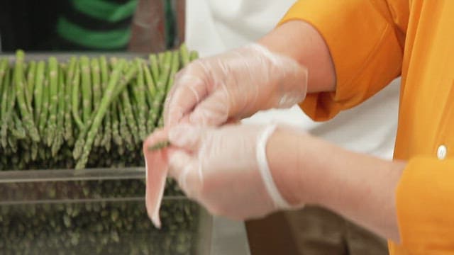 Asparagus Rolled into Thin-Sliced ​​Pork Belly in Kitchen
