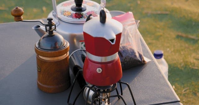 Coffee Making Set on Table at Dusk