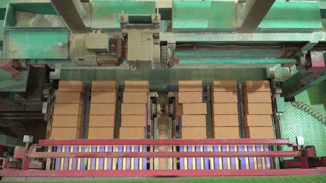Bricks on a conveyor belt in a factory