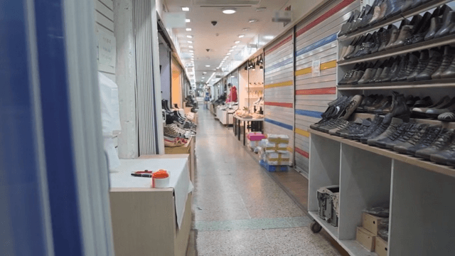 Shoe Stores Lined up in the Hallway