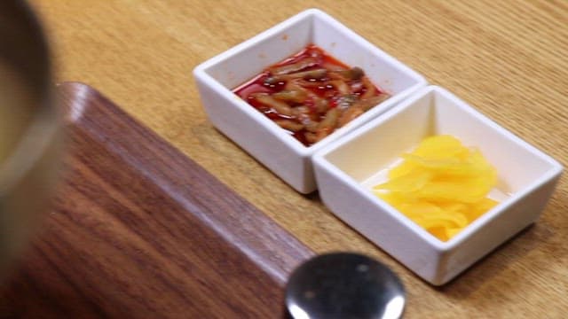 Bowl of delicious cold noodles served on the table