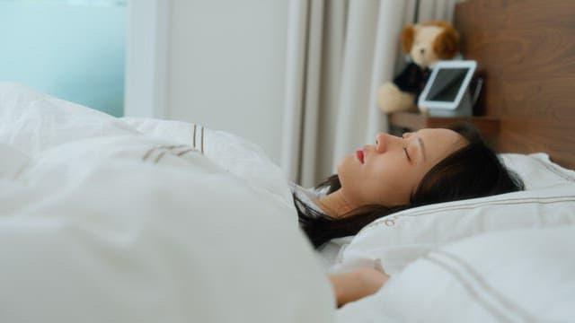 Woman Resting in Bed Throughout the Day