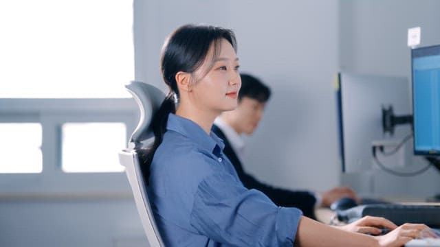 Woman smiling in the office