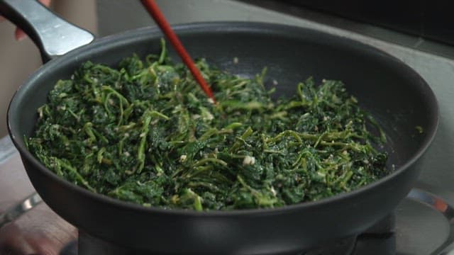 Stir-frying Korean Thistle in a Frying Pan