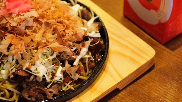 Delicious Yakisoba topped with katsuobushi and vegetables