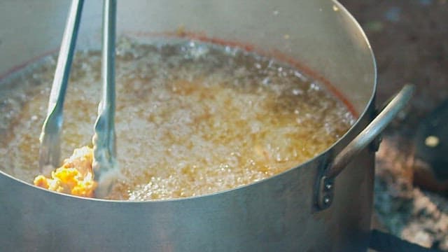 Fish fry in hot oil in a pan