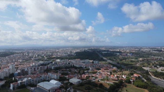 Towering Statue of Christ the Redeemer Under a Clear Sky