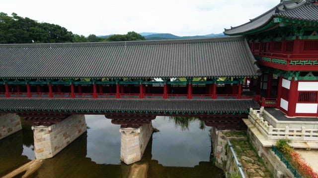 Traditional Korean bridge over a calm river