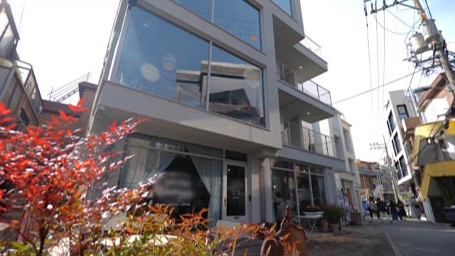 Four-story Building in a Urban Alley in the Middle of the Day