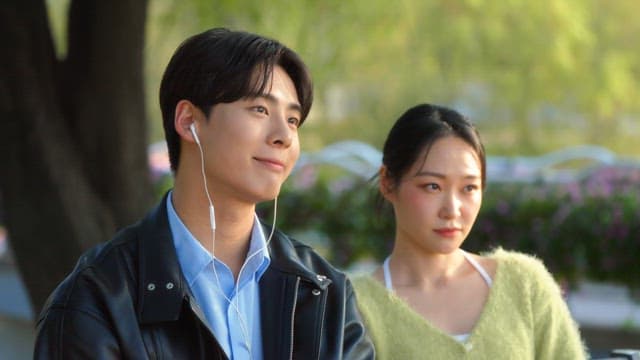 Couple enjoying music together outdoors