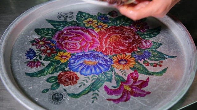 Two plates of delicious tteokgalbi served on a large platter