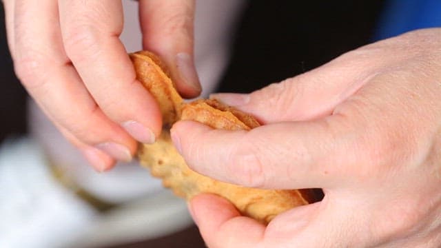 Golden-yellow fish-shaped bread filled with red bean paste