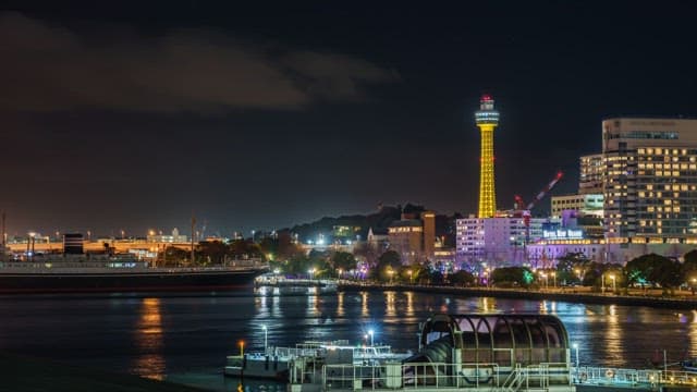 Night view of a city with a lit tower