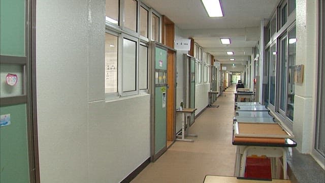 Empty School Corridor with Fluorescent Light