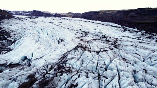 Vast glacier landscape with rugged terrain