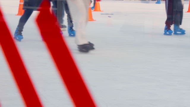 People skating on an ice rink