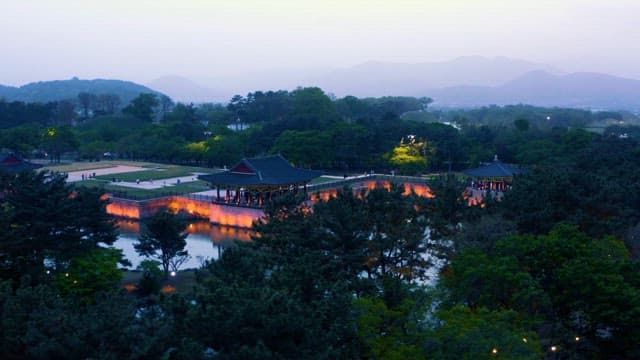 Donggung and Wolji Illuminated in the Dark Evening