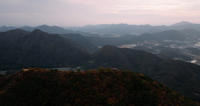 Tranquil Twilight Over Mountainous Landscape