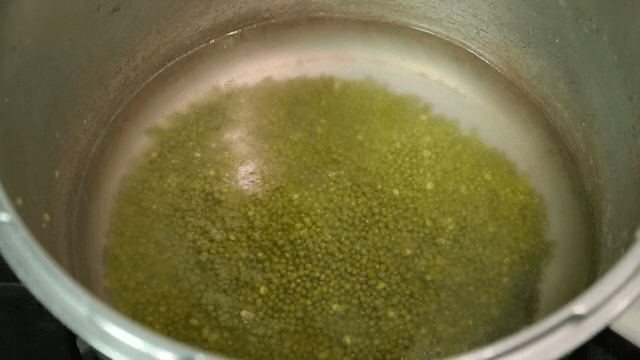 Mung beans boiling in a big pot