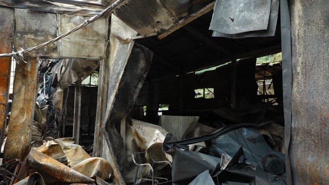 Messy remains of a fire-torn building