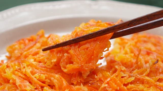 Chopstick of Golden Brown Carrot Pancake on a Plate