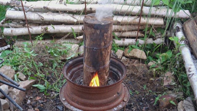 Smoke coming out of a crack in the firewood