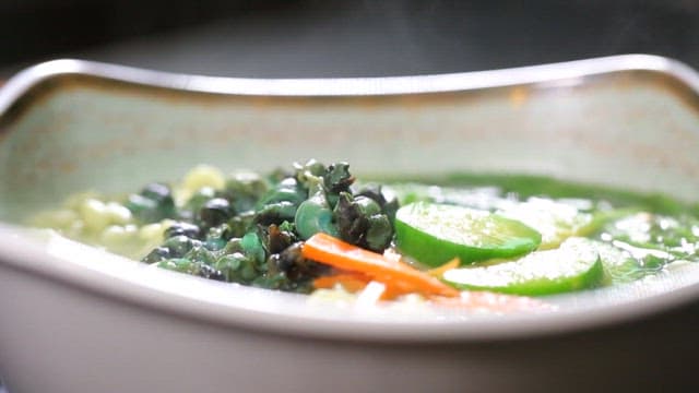 Bowl of steaming hot marsh snail ramen