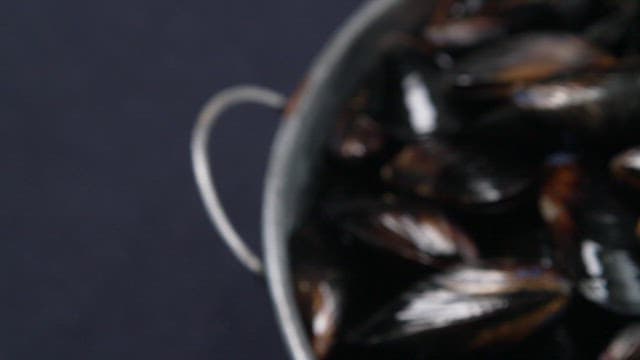 Fresh mussels in a pot