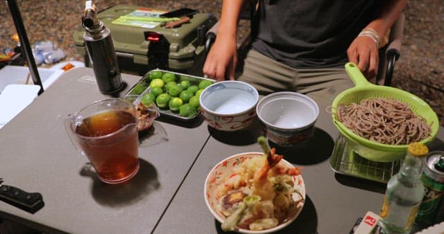 Outdoor Nighttime Noodle Preparation