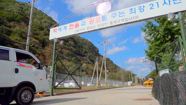 Trucks Entering Civilian-Controlled Military Zone