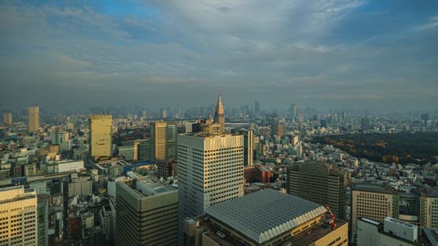 City skyline transitioning from day to night