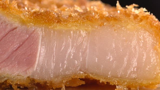 Juicy fried pork cutlet with crispy crust